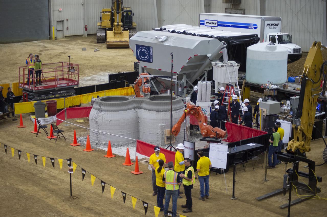 Team Penn State prepares their 3D-printer to begin printing a subscale habitat structure at NASA's 3D-Printed Habitat Challenge, held at the Caterpillar Edwards Demonstration & Learning Center in Edwards, Illinois, May 1-4, 2019. The habitat print is the final level of the multi-phase competition, which began in in 2015. The 3D-Printed Habitat Challenge is a competition to create sustainable shelters suitable for the Moon, Mars or beyond using resources available on-site in these locations. The challenge is managed by NASA's Centennial Challenges program, and partner Bradley University of Peoria, Illinois. 