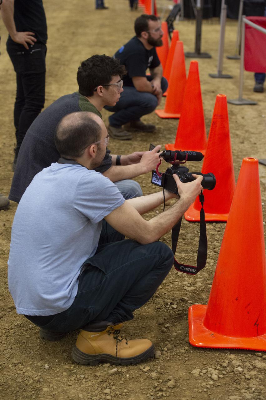 Team Penn State prepares their 3D-printer to begin printing a subscale habitat structure at NASA's 3D-Printed Habitat Challenge, held at the Caterpillar Edwards Demonstration & Learning Center in Edwards, Illinois, May 1-4, 2019. The habitat print is the final level of the multi-phase competition, which began in in 2015. The 3D-Printed Habitat Challenge is a competition to create sustainable shelters suitable for the Moon, Mars or beyond using resources available on-site in these locations. The challenge is managed by NASA's Centennial Challenges program, and partner Bradley University of Peoria, Illinois.