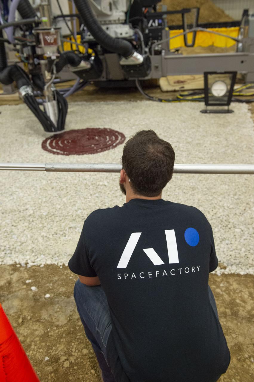 Team Penn State prepares their 3D-printer to begin printing a subscale habitat structure at NASA's 3D-Printed Habitat Challenge, held at the Caterpillar Edwards Demonstration & Learning Center in Edwards, Illinois, May 1-4, 2019. The habitat print is the final level of the multi-phase competition, which began in in 2015. The 3D-Printed Habitat Challenge is a competition to create sustainable shelters suitable for the Moon, Mars or beyond using resources available on-site in these locations. The challenge is managed by NASA's Centennial Challenges program, and partner Bradley University of Peoria, Illinois.