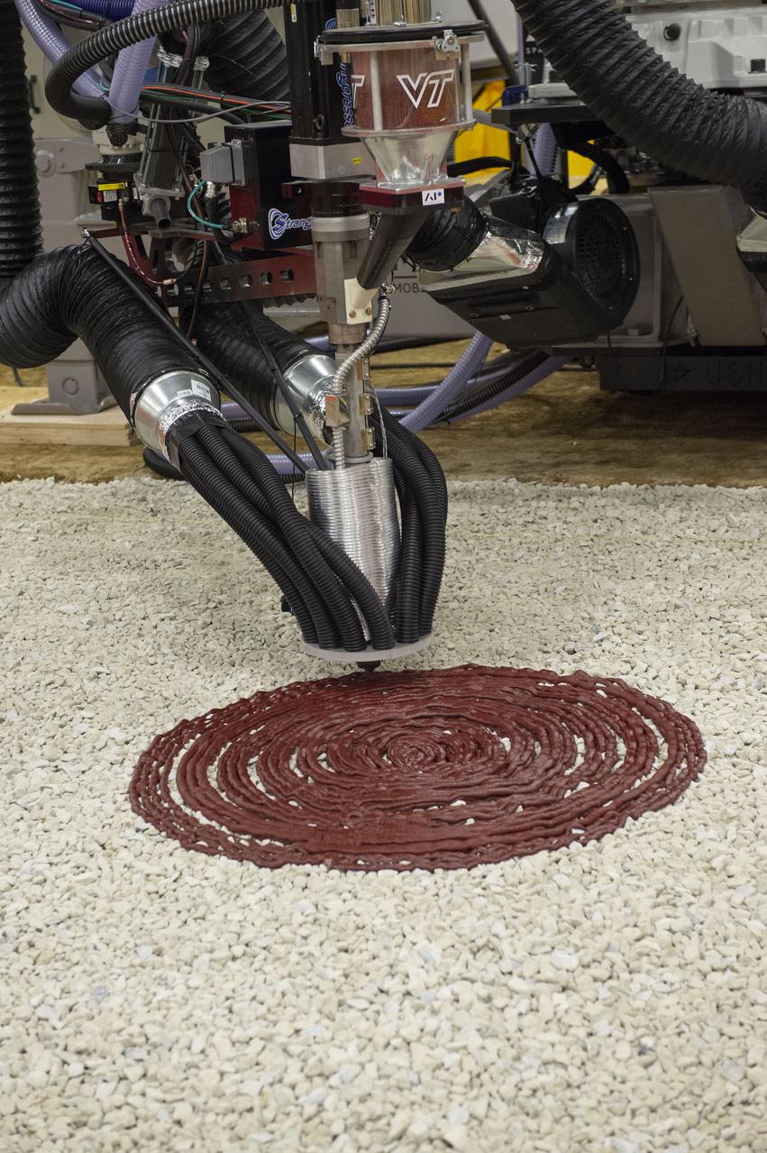 Team Penn State prepares their 3D-printer to begin printing a subscale habitat structure at NASA's 3D-Printed Habitat Challenge, held at the Caterpillar Edwards Demonstration & Learning Center in Edwards, Illinois, May 1-4, 2019. The habitat print is the final level of the multi-phase competition, which began in in 2015. The 3D-Printed Habitat Challenge is a competition to create sustainable shelters suitable for the Moon, Mars or beyond using resources available on-site in these locations. The challenge is managed by NASA's Centennial Challenges program, and partner Bradley University of Peoria, Illinois.