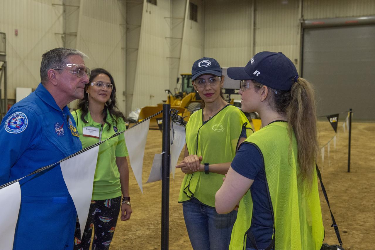 Center in Edwards, Illinois, May 1-4, 2019. The habitat print is the final level of the multi-phase competition, which began in in 2015. The challenge is managed by NASA's Centennial Challenges program, and partner Bradley University of Peoria, Illinois.  Astronaut Don Thomas talks with Penn State team members Negar Ashrafi and Maryam Hojati.
