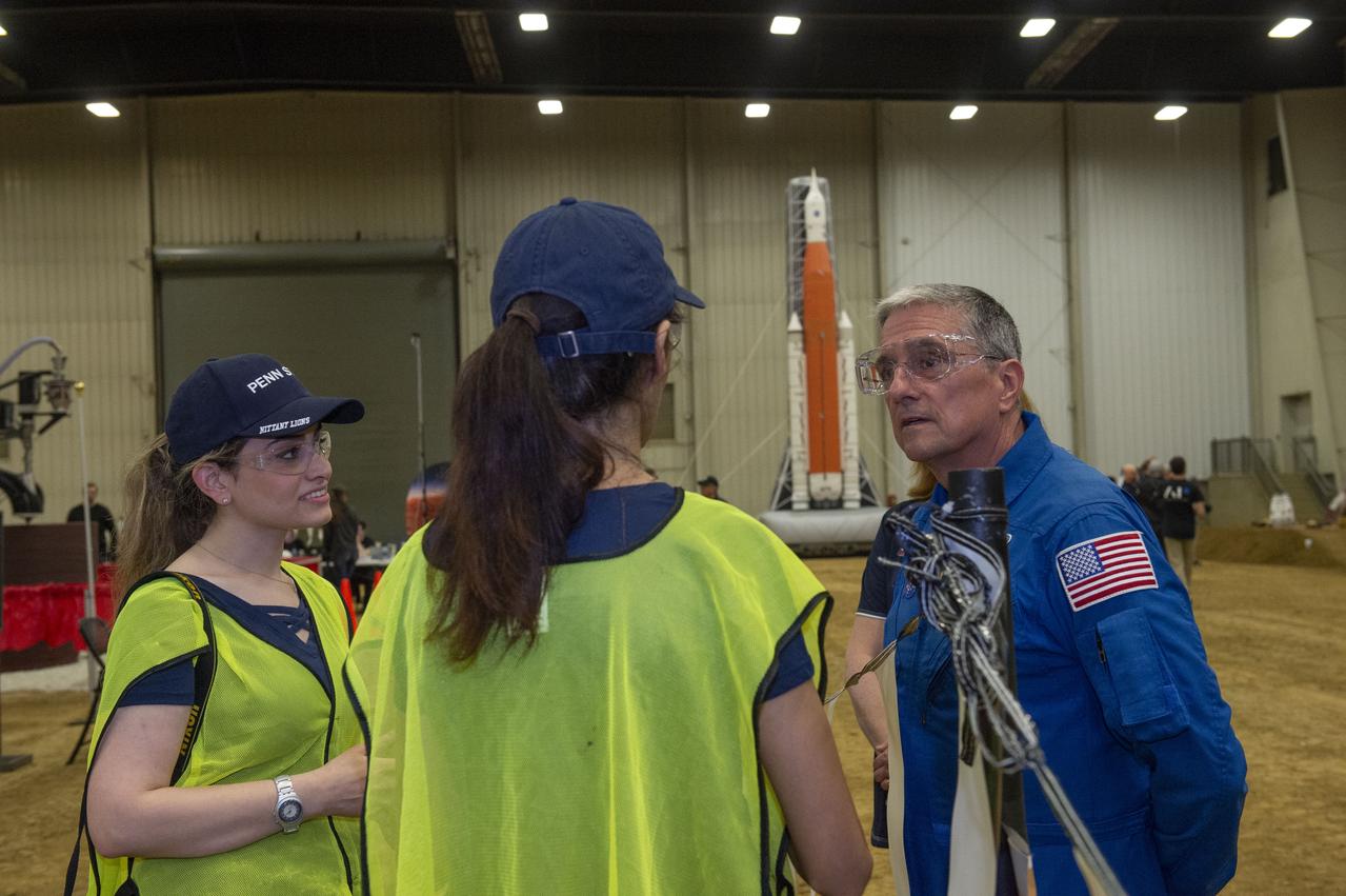 Center in Edwards, Illinois, May 1-4, 2019. The habitat print is the final level of the multi-phase competition, which began in in 2015. The challenge is managed by NASA's Centennial Challenges program, and partner Bradley University of Peoria, Illinois.  Astronaut Don Thomas talks with Penn State team members Negar Ashrafi and Maryam Hojati.