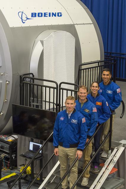 NASA image: crew from Bottom to top:  Warren “Woody” Hoburg, Stan Love, 