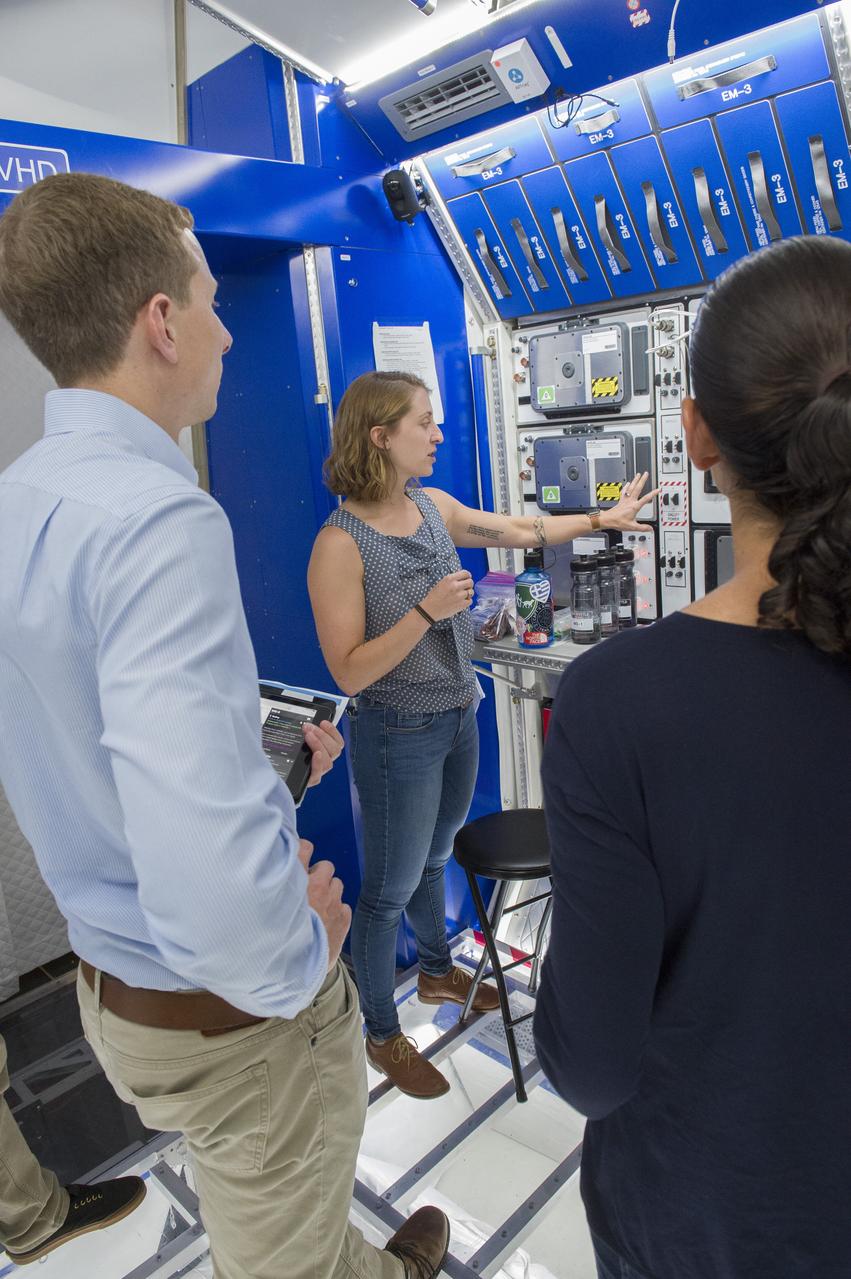 Boeing trainers conduct simulations inside the Boeing Exploration Habitat Demonstrator with astronauts to evaluate the internal layout and ergonomics, to support efficient work-life balance aboard a deep space ship.