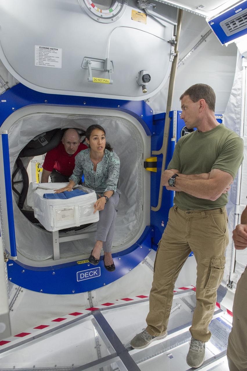 Boeing trainers conduct simulations inside the Boeing Exploration Habitat Demonstrator with astronauts to evaluate the internal layout and ergonomics, to support efficient work-life balance aboard a deep space ship.