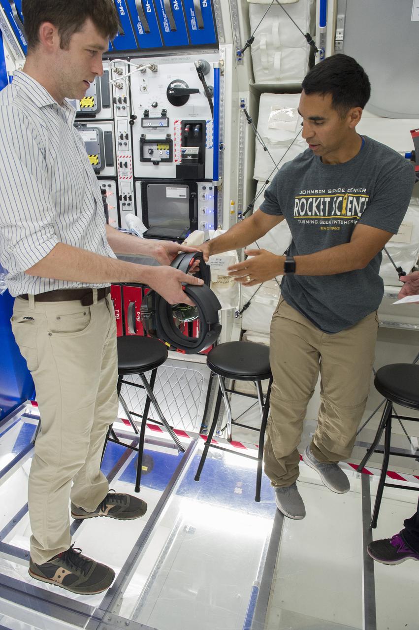 Boeing trainers conduct simulations inside the Boeing Exploration Habitat Demonstrator with astronauts to evaluate the internal layout and ergonomics, to support efficient work-life balance aboard a deep space ship.