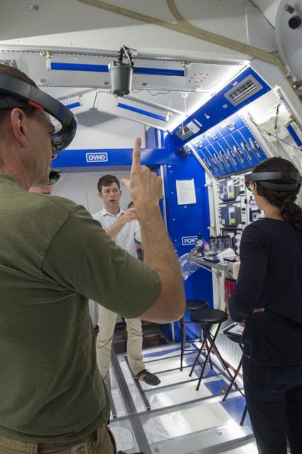 NASA image: Boeing trainers conduct simulations inside the Boeing Exploratio