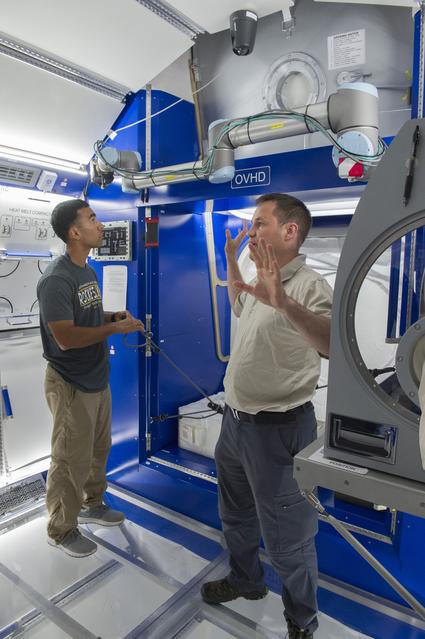 NASA image: Boeing trainers conduct simulations inside the Boeing Exploratio