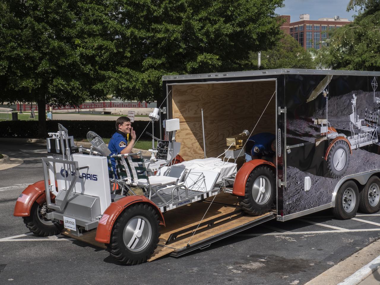 The City of Huntsville hosted a celebration of the Apollo 11 Moon landing with a street party on the downtown square with exhibits from the Marshall Space Flight Center and contributing contractors. The event was kicked off with remarks from Huntsville Mayor Tommy Battle, Marshall Space Flight Center's Director Jody Singer, and U.S. Space and Rocket Center's Director Deborah Barnhart with the Polaris replica of the Lunar Moon Buggy in the foreground.  The Polaris Lunar Rover replica is being driven out of its trailer.