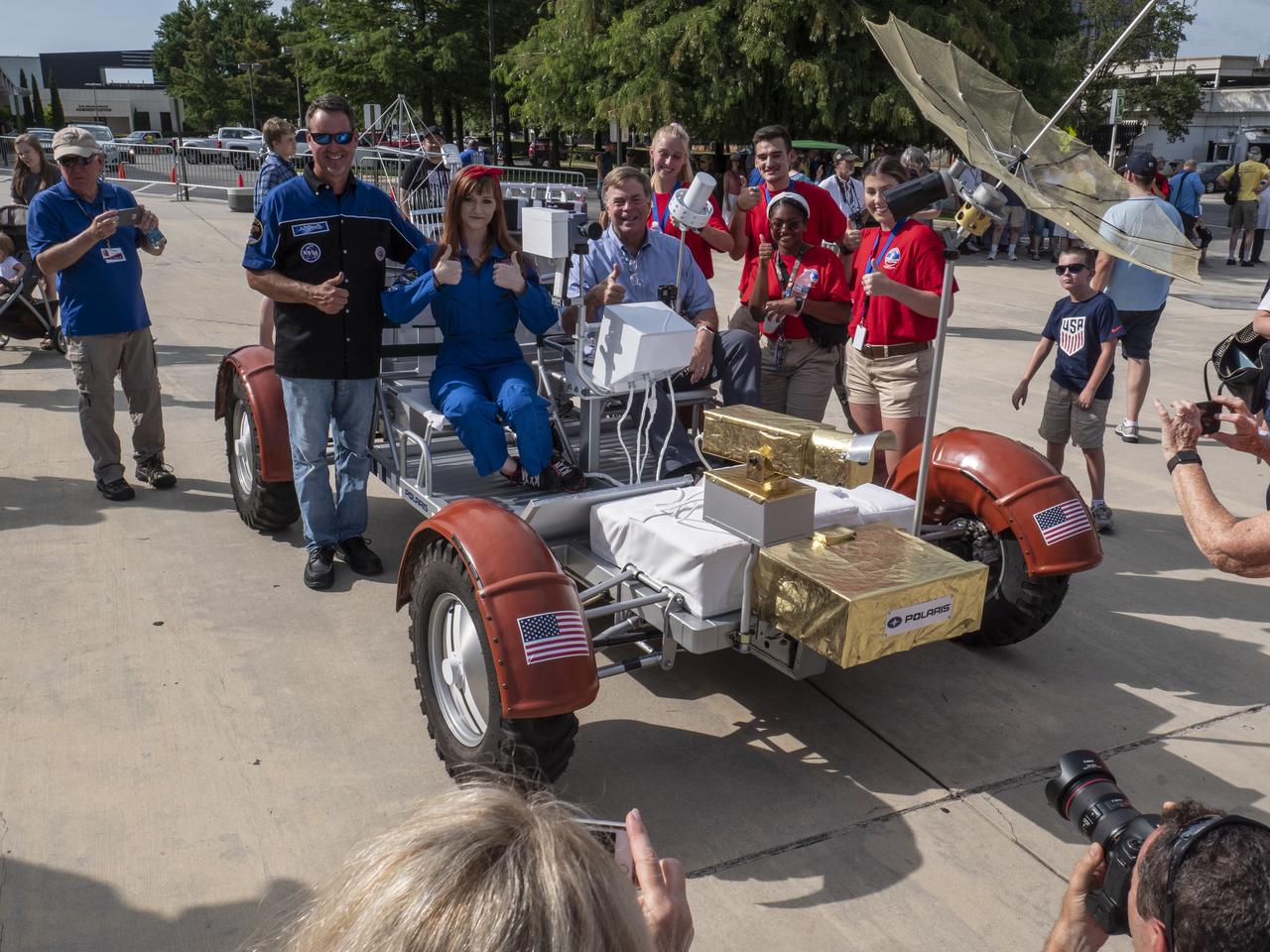 The City of Huntsville hosted a celebration of the Apollo 11 Moon landing with a street party on the downtown square with exhibits from the Marshall Space Flight Center and contributing contractors. The event was kicked off with remarks from Huntsville Mayor Tommy Battle, Marshall Space Flight Center's Director Jody Singer, and U.S. Space and Rocket Center's Director Deborah Barnhart with the Polaris replica of the Lunar Moon Buggy in the foreground. Huntsville Mayor Tommy Battle with the Polaris representative and representatives from the U.S. Space and Rocket Center
