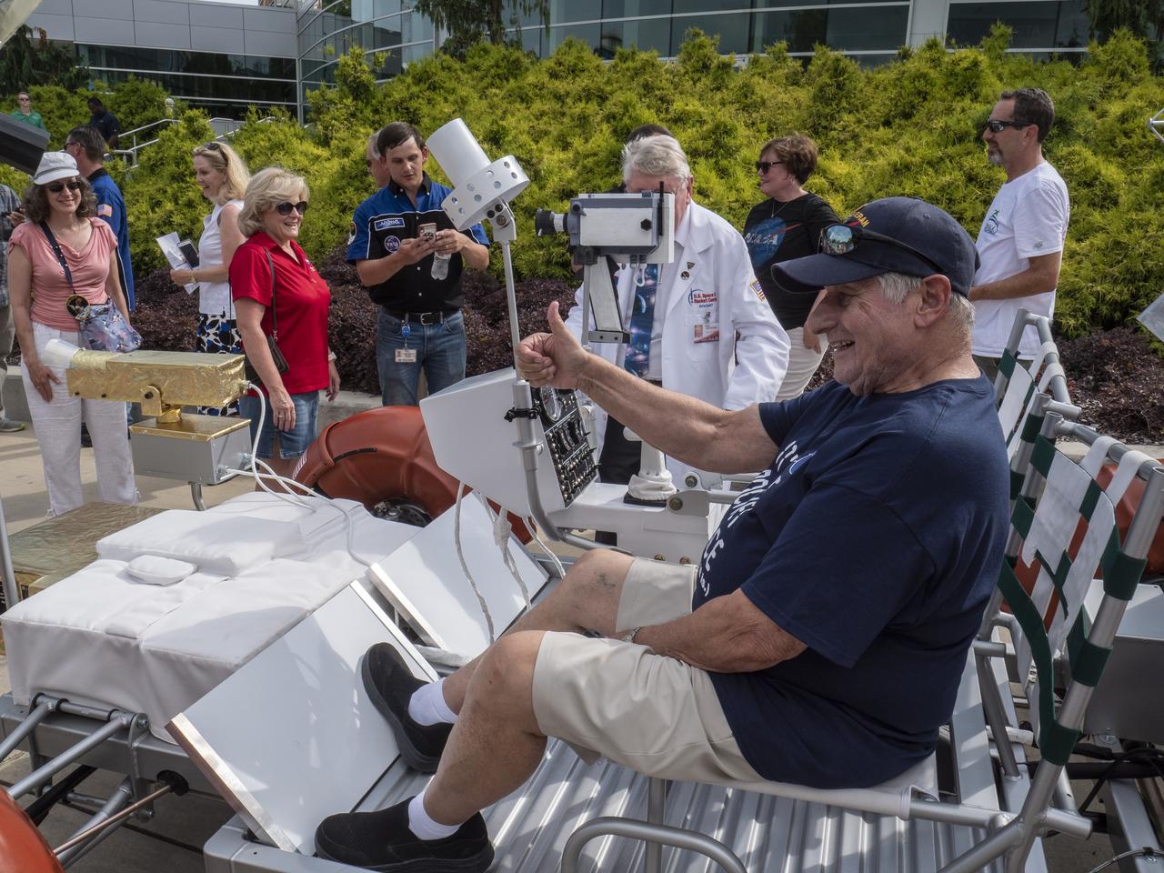 The City of Huntsville hosted a celebration of the Apollo 11 Moon landing with a street party on the downtown square with exhibits from the Marshall Space Flight Center and contributing contractors. The event was kicked off with remarks from Huntsville Mayor Tommy Battle, Marshall Space Flight Center's Director Jody Singer, and U.S. Space and Rocket Center's Director Deborah Barnhart with the Polaris replica of the Lunar Moon Buggy in the foreground.  Retired NASA engineer Sonny Morea sits in the Polaris Lunar Rover Replica