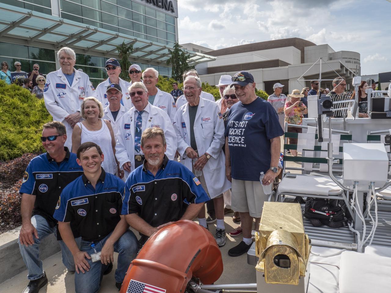 The City of Huntsville hosted a celebration of the Apollo 11 Moon landing with a street party on the downtown square with exhibits from the Marshall Space Flight Center and contributing contractors. The event was kicked off with remarks from Huntsville Mayor Tommy Battle, Marshall Space Flight Center's Director Jody Singer, and U.S. Space and Rocket Center's Director Deborah Barnhart with the Polaris replica of the Lunar Moon Buggy in the foreground. The Polaris Lunar Rover development team poses with retired NASA personnel who also volunteer as docents at the U.S. Space and Rocket Center.