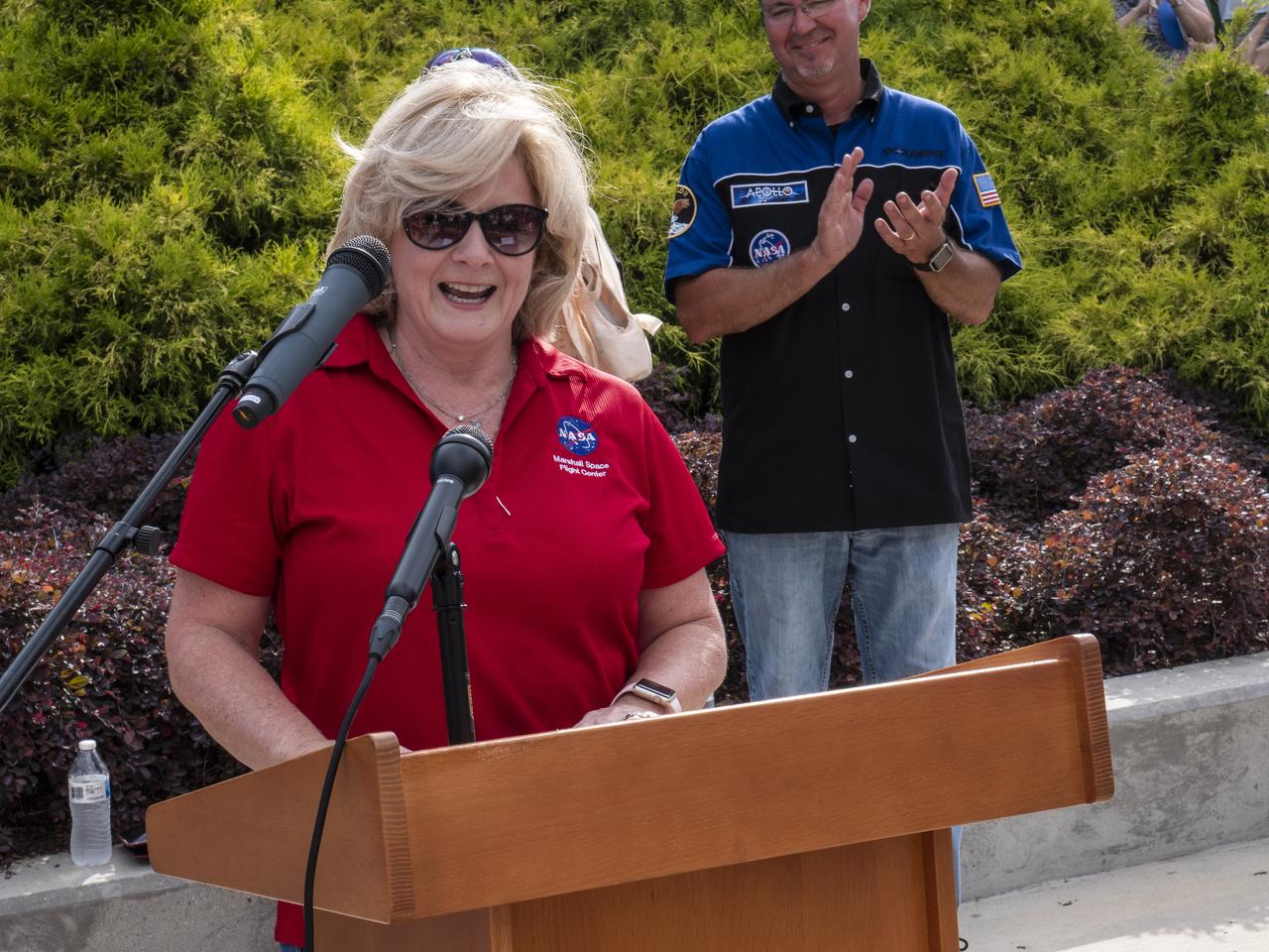 The City of Huntsville hosted a celebration of the Apollo 11 Moon landing with a street party on the downtown square with exhibits from the Marshall Space Flight Center and contributing contractors. The event was kicked off with remarks from Huntsville Mayor Tommy Battle, Marshall Space Flight Center's Director Jody Singer, and U.S. Space and Rocket Center's Director Deborah Barnhart with the Polaris replica of the Lunar Moon Buggy in the foreground. Marshall Center Director Jody Singer addresses the crowd.