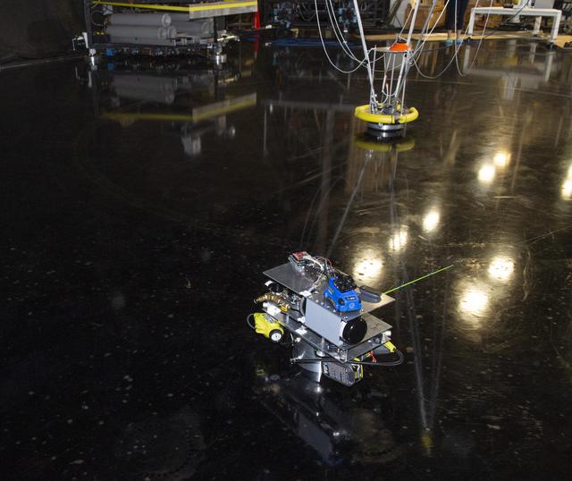 NASA image: STEERABLE AIR BEARING TETHER DEPLOYMENT