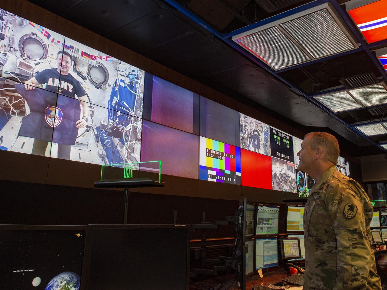 Army Lt. Gen. James Dickinson, right, commanding general of the U.S. Army Space and Missile Defense Command, speaks with NASA astronaut and current International Space Station crew member Andrew Morgan, an Army colonel, during an Oct. 8 downlink to the Payload Operations Integration Center at NASA’s Marshall Space Flight Center.