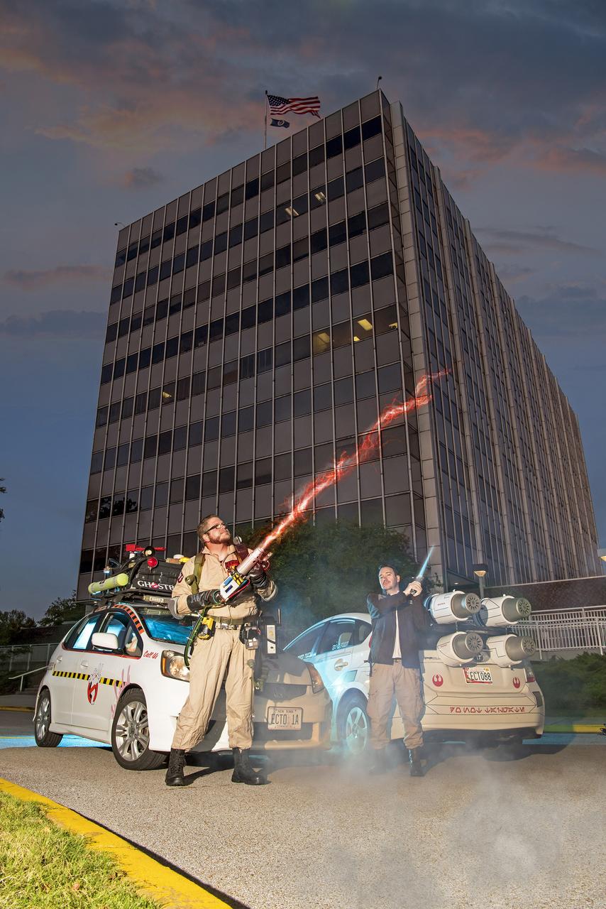 Andrew Denio, a Marshall information technology specialist in the Office of the Chief Information Officer, and Judson Hudson, a lab technician and computer-aided designer in Marshall’s Valve & Component Laboratory, show off their Ghostbusters and Star Wars themed vehicles in front of MSFC building 4200, for Halloween 2019. 
