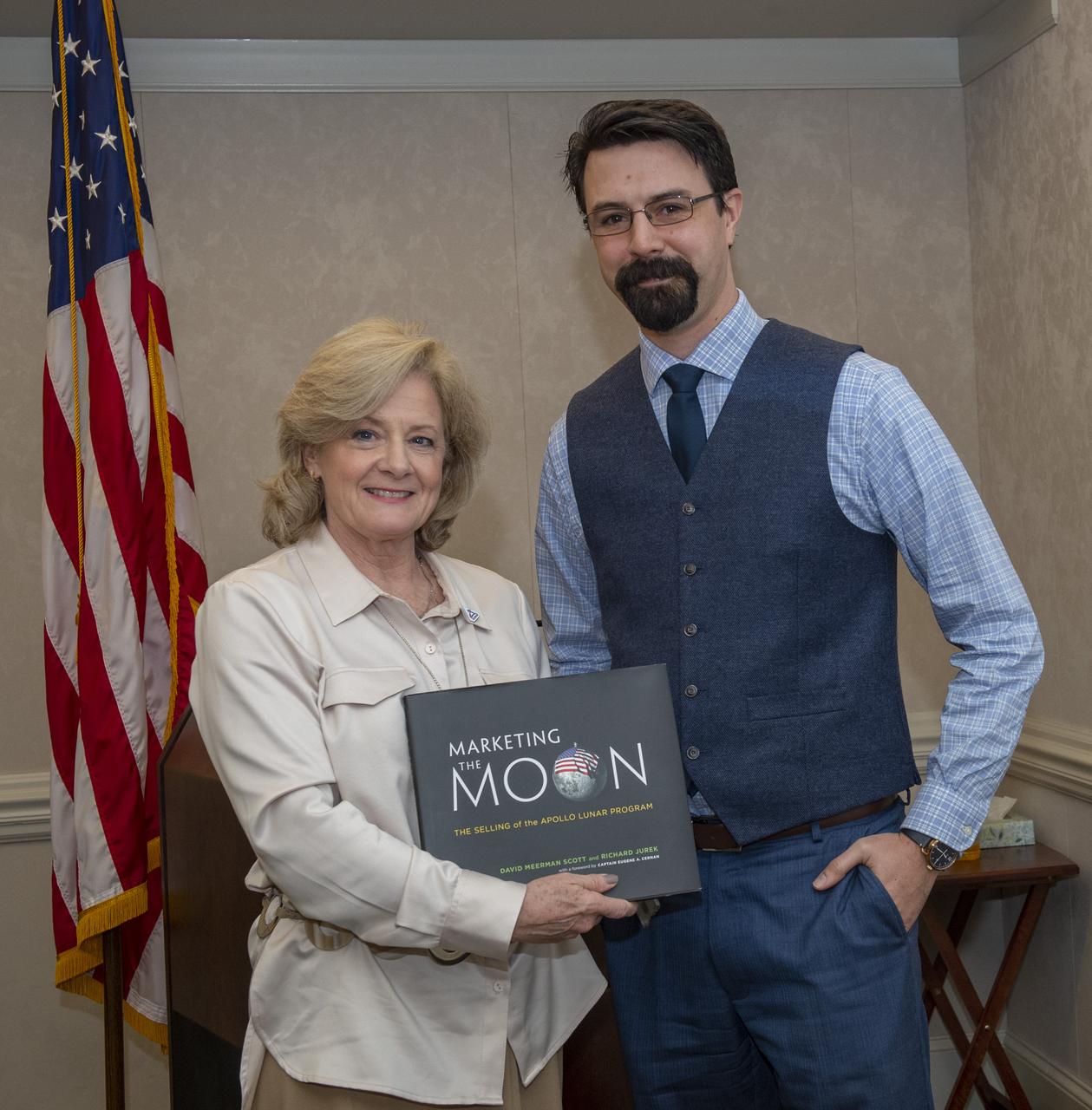 Matthew McSavaney presents memento to Jody Singer in appreciation of her speaking at February, 2020, Marshall Association Luncheon. 