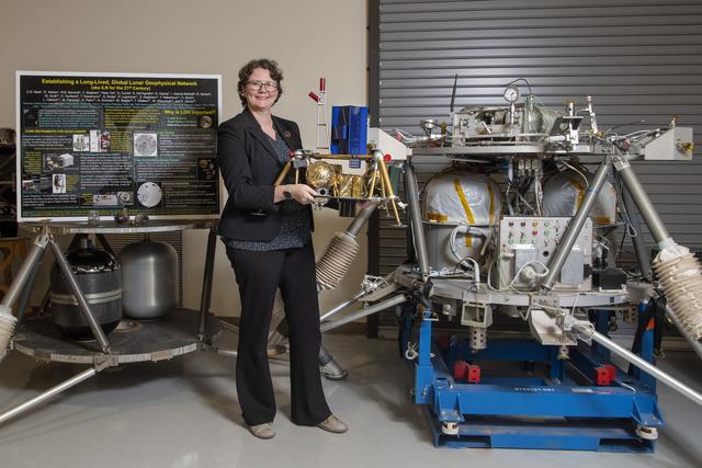 NASA image: MSFC Chief Scientist Renee Weber with Lunar Lander Models