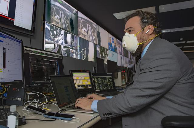 NASA image:  Adam Butt and Teams at NASA’s Marshall Space Flight Center help monitor launch conditions for the Demo-2 mission from the Huntsville Operations Support Center, HOSC.