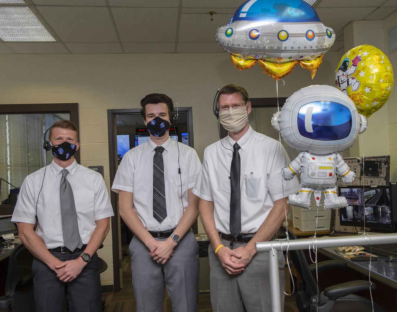 Patrick Mills, Stewart Whaley, Cameron Muelling and teams at NASA’s Marshall Space Flight Center help monitor launch conditions for the Demo-2 mission from the Huntsville Operations Support Center, HOSC.