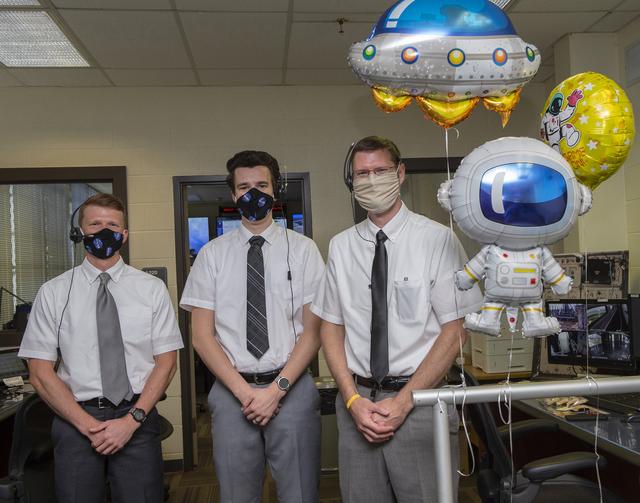 Patrick Mills, Stewart Whaley, Cameron Muelling and teams at NASA’s Marshall Space Flight Center help monitor launch conditions for the Demo-2 mission from the Huntsville Operations Support Center, HOSC.