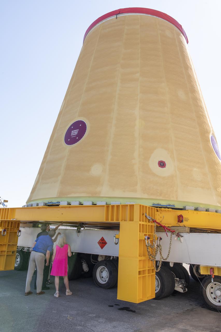Jody Singer, director of NASA’s Marshall Space Flight Center in Huntsville, Alabama, joins local government officials and others as the Marshall move team prepares to transport the Artemis I launch vehicle stage adapter for the agency’s Space Launch System (SLS) rocket. Huntsville-based Teledyne Brown Engineering built the launch vehicle stage adapter at a state-of-the-art manufacturing facility at Marshall. Teledyne officials joined Singer to see the adapter one last time before it heads to the barge. This is the last piece of Marshall-built SLS rocket hardware set for delivery to Kennedy in preparation of the Artemis I mission to the Moon. A move team led by Marshall’s Center Operations will transport the adapter from the manufacturing facility to NASA’s Pegasus barge. The barge will take the adapter to NASA’s Kennedy Space Center in Florida for assembly and launch. Other parts of the Artemis I SLS rocket that were manufactured in Alabama include the Orion stage adapter built by Marshall teams and the Interim Cryogenic Propulsion Stage, which was built by Boeing and United Launch Alliance in Decatur, Alabama and will provide the power to send Orion to the Moon.
