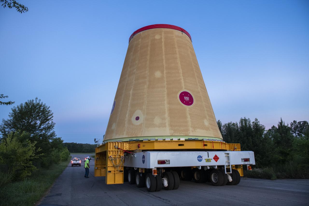 The move team loads the launch vehicle stage adapter, part of the agency’s new Space Launch System (SLS) rocket, on NASA’s Pegasus barge at NASA’s Marshall Space Flight Center in Huntsville, Alabama, July 17. The launch vehicle stage adapter, which connects the rocket’s 212-foot-tall core stage to the rocket’s upper stage, is being shipped to NASA’s Kennedy Space Center in Florida for Artemis I launch preparations. This is the final piece of Artemis I SLS rocket hardware built at Marshall to be delivered to Kennedy. Only the SLS core stage, currently in final testing at Stennis Space Center near Bay St. Louis, Mississippi, remains to be shipped to Kennedy on Pegasus. NASA is working to land the first woman and the next man on the Moon by 2024. SLS, along with Orion, the human landing system, and the Gateway in orbit around the Moon are NASA’s backbone for a new generation of deep space exploration.  