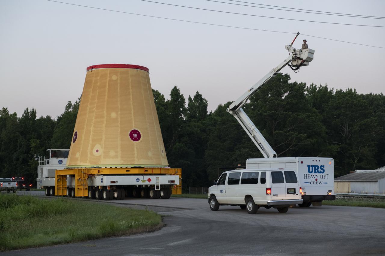 The move team loads the launch vehicle stage adapter, part of the agency’s new Space Launch System (SLS) rocket, on NASA’s Pegasus barge at NASA’s Marshall Space Flight Center in Huntsville, Alabama, July 17. The launch vehicle stage adapter, which connects the rocket’s 212-foot-tall core stage to the rocket’s upper stage, is being shipped to NASA’s Kennedy Space Center in Florida for Artemis I launch preparations. This is the final piece of Artemis I SLS rocket hardware built at Marshall to be delivered to Kennedy. Only the SLS core stage, currently in final testing at Stennis Space Center near Bay St. Louis, Mississippi, remains to be shipped to Kennedy on Pegasus. NASA is working to land the first woman and the next man on the Moon by 2024. SLS, along with Orion, the human landing system, and the Gateway in orbit around the Moon are NASA’s backbone for a new generation of deep space exploration.  
