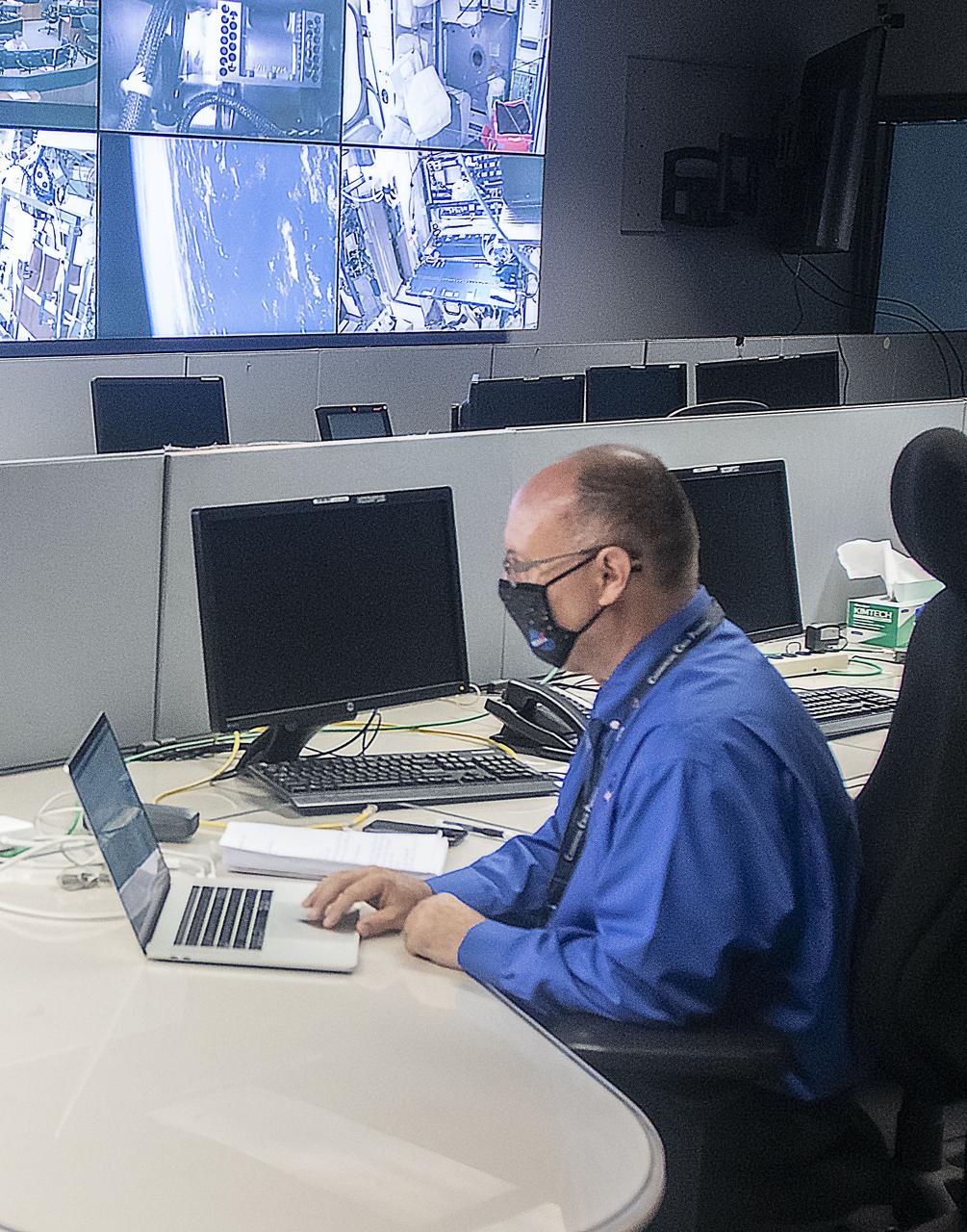 Teams at NASAâ€™s Marshall Space Flight Center help monitor launch conditions for the Crew 1 mission from the Huntsville Operations Support Center in Huntsville, Alabama. SpaceX will launch a Falcon 9 rocket carrying NASA astronauts aboard the companyâ€™s Crew Dragon spacecraft to the International Space Station on Nov. 14, 2020.    The Marshall team is supporting flight control teams working with NASAâ€™s Johnson Space Center in Houston, Texas, NASAâ€™s Kennedy Space Center in Cape Canaveral, Florida, and SpaceX headquarters in Hawthorne, California, as they monitor the different phases of the upcoming mission. Engineers and technicians at Marshall will use headsets and loops to communicate with the multiple locations on console for the launch.    The Crew 1 flight is part of NASAâ€™s Commercial Crew Program. The Crew 1 astronauts will arrive at the space station for docking a short time later at 4:20 a.m. on Sunday, Nov. 15  to join Expedition 64 for a six-month science mission.