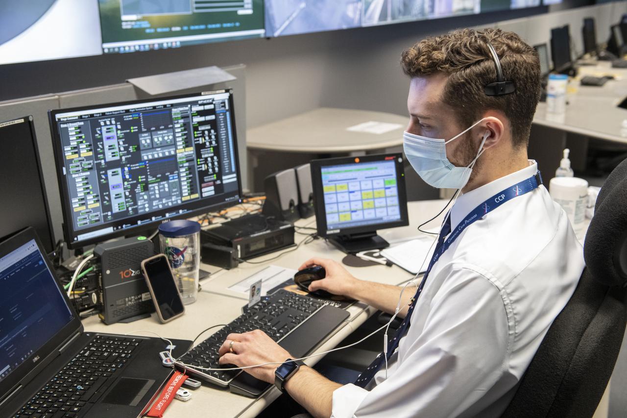 Teams at NASA’s Marshall Space Flight Center help monitor launch conditions for the Crew 1 mission from the Huntsville Operations Support Center in Huntsville, Alabama. SpaceX will launch a Falcon 9 rocket carrying NASA astronauts aboard the company’s Crew Dragon spacecraft to the International Space Station on Nov. 15, 2020.    The Marshall team is supporting flight control teams working with NASA’s Johnson Space Center in Houston, Texas, NASA’s Kennedy Space Center in Cape Canaveral, Florida, and SpaceX headquarters in Hawthorne, California, as they monitor the different phases of the upcoming mission. Engineers and technicians at Marshall will use headsets and loops to communicate with the multiple locations on console for the launch.   
