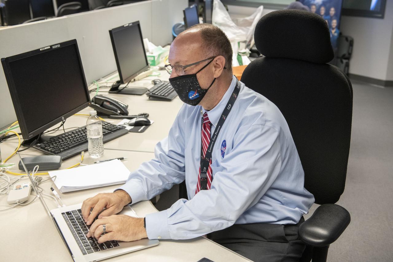 Teams at NASAâ€™s Marshall Space Flight Center help monitor launch conditions for the Crew 1 mission from the Huntsville Operations Support Center in Huntsville, Alabama. SpaceX will launch a Falcon 9 rocket carrying NASA astronauts aboard the companyâ€™s Crew Dragon spacecraft to the International Space Station on Nov. 15, 2020.    The Marshall team is supporting flight control teams working with NASAâ€™s Johnson Space Center in Houston, Texas, NASAâ€™s Kennedy Space Center in Cape Canaveral, Florida, and SpaceX headquarters in Hawthorne, California, as they monitor the different phases of the upcoming mission. Engineers and technicians at Marshall will use headsets and loops to communicate with the multiple locations on console for the launch.   