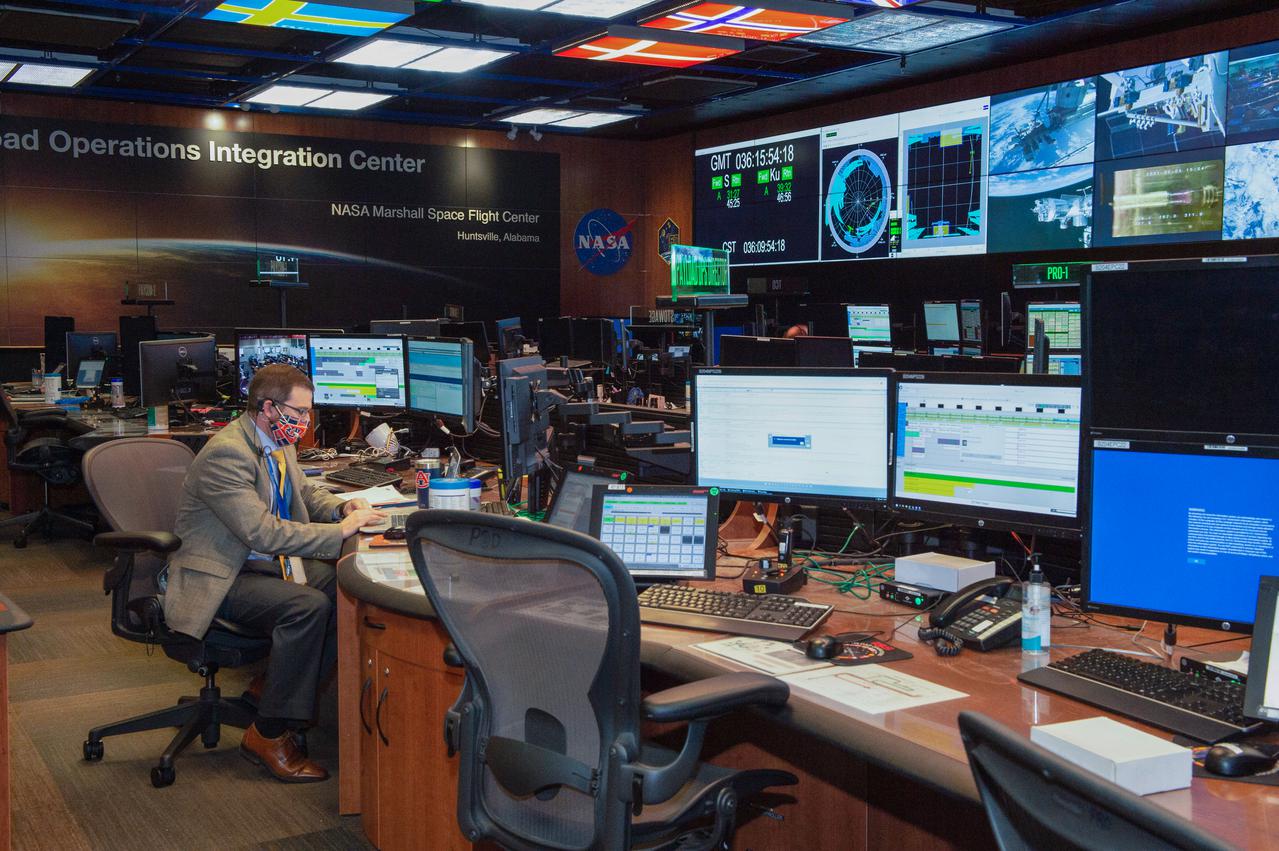 A look inside the International Space Station Payload Operations Integration Center at NASA’s Marshall Space Flight Center in Huntsville, AL.  The POIC team supports science operations on the International Space Station 24 hours a day, 7 days a week. For more than 20 years the POIC team has worked with scientists from around the world to enable the space station crew to conduct experiments that improve life on Earth and enable future exploration.