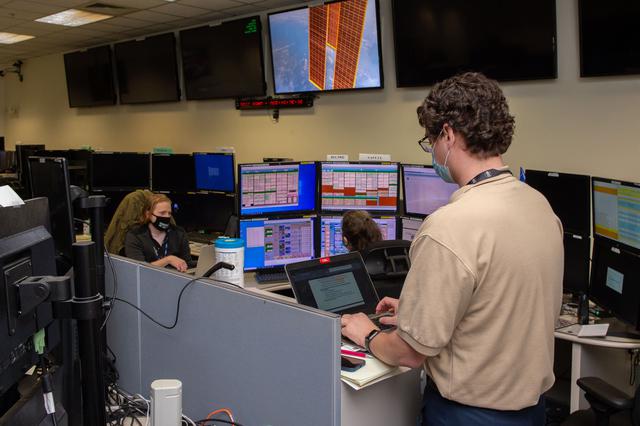 NASA image: A look inside the International Space Station Payload Operations Integration Center at NASA’s Marshall Space Flight Center in Huntsville, AL.  The POIC team supports science operations on the International Space Station 24 hours a day, 7 days a week. For more than 20 years the POIC team has worked with scientists from around the world to enable the space station crew to conduct experiments that improve life on Earth and enable future exploration.