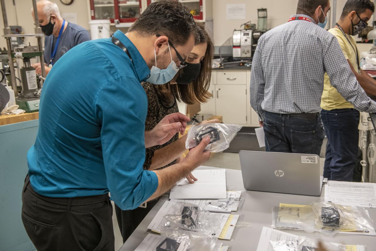 Scientists at NASA's Marshall Space Flight Center in Huntsville, Alabama, clean equipment and prepare for shipment of the ring sheared drop payload currently set for launch on Northrop Grumman 16 the first week in August, 2021.  The payload studies the formation of potentially destructive amyloid fibrils, or protein clusters, like those found in the brain tissue of patients battling neurodegenerative diseases. Such illnesses may damage neurons, the drivers of the human nervous system. Experimentation in microgravity provides the opportunity to study amyloid fibril formation in conditions more analogous to those found in the human body than can be studied in a ground-based laboratory environment.