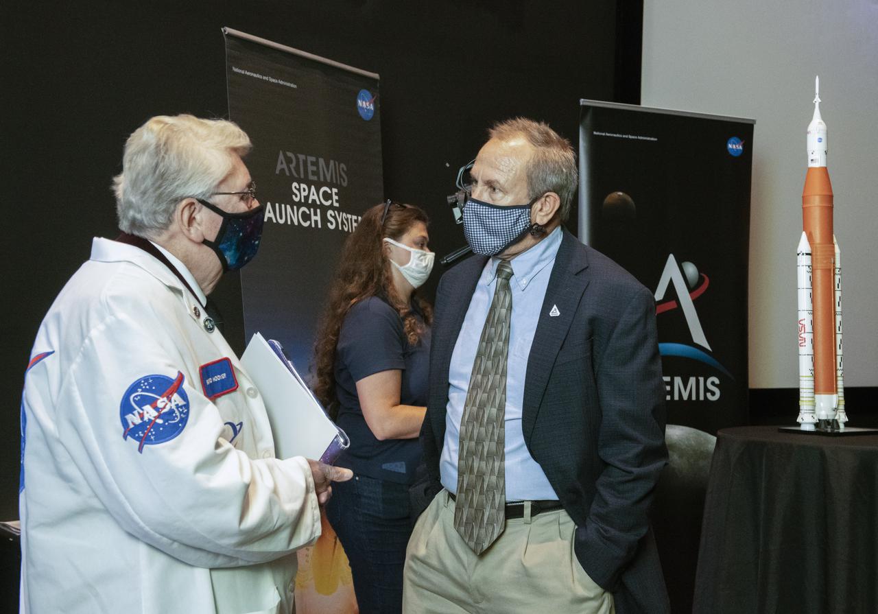 Dr. Richard Hoover talks to David Beaman, SLS Systems Engineering and Integration Manager, at conclusion of Chamber Media Briefing event at USSRC