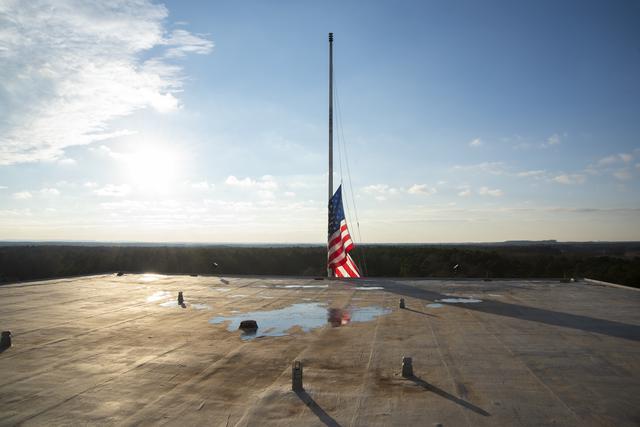 NASA image: U.S. Flag Retired from Marshall Building 4200 
