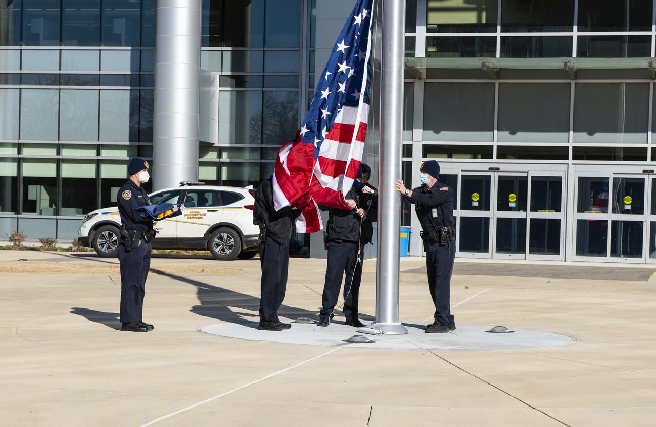 On Jan. 26, 2022, the U.S. and NASA flags were raised at Building 4221 to mark the transfer of headquarters to that building at Marshall Space Flight Center in Huntsville, Alabama. The doors to Building 4221, a new, environmentally friendly building, opened on Earth Day, April 22, 2019. Building 4200 served as Marshall’s original headquarters  since 1963. Marshall center operations lowered flags at that building on Jan. 21, 2022.