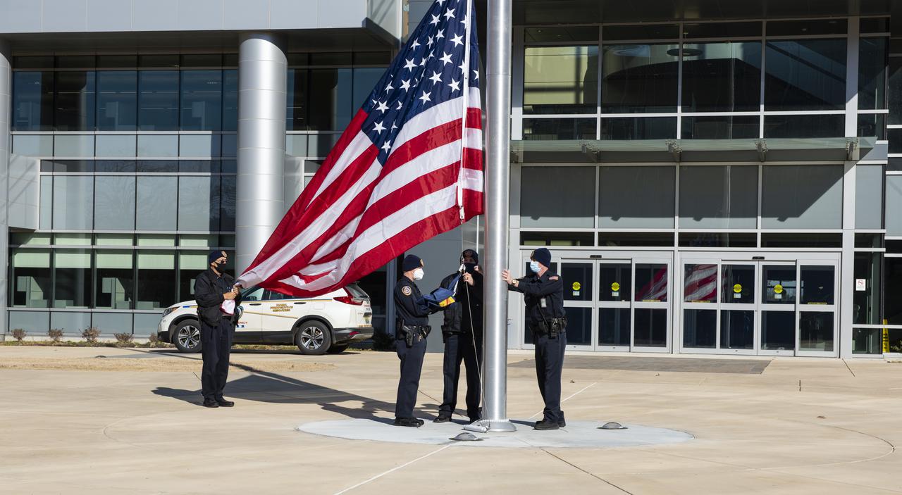 On Jan. 26, 2022, the U.S. and NASA flags were raised at Building 4221 to mark the transfer of headquarters to that building at Marshall Space Flight Center in Huntsville, Alabama. The doors to Building 4221, a new, environmentally friendly building, opened on Earth Day, April 22, 2019. Building 4200 served as Marshall’s original headquarters  since 1963. Marshall center operations lowered flags at that building on Jan. 21, 2022.