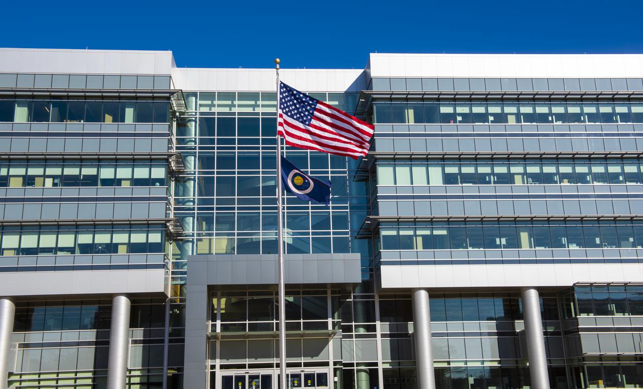 On Jan. 26, 2022, the U.S. and NASA flags were raised at Building 4221 to mark the transfer of headquarters to that building at Marshall Space Flight Center in Huntsville, Alabama. The doors to Building 4221, a new, environmentally friendly building, opened on Earth Day, April 22, 2019. Building 4200 served as Marshall’s original headquarters  since 1963. Marshall center operations lowered flags at that building on Jan. 21, 2022.