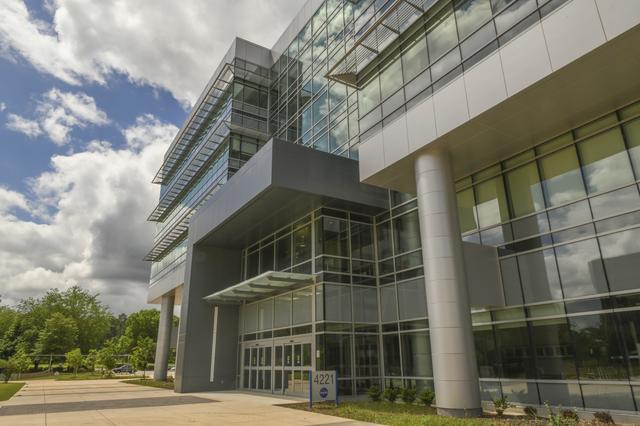 NASA image: NASA Marshall Space Flight Center campus buildings during demoli