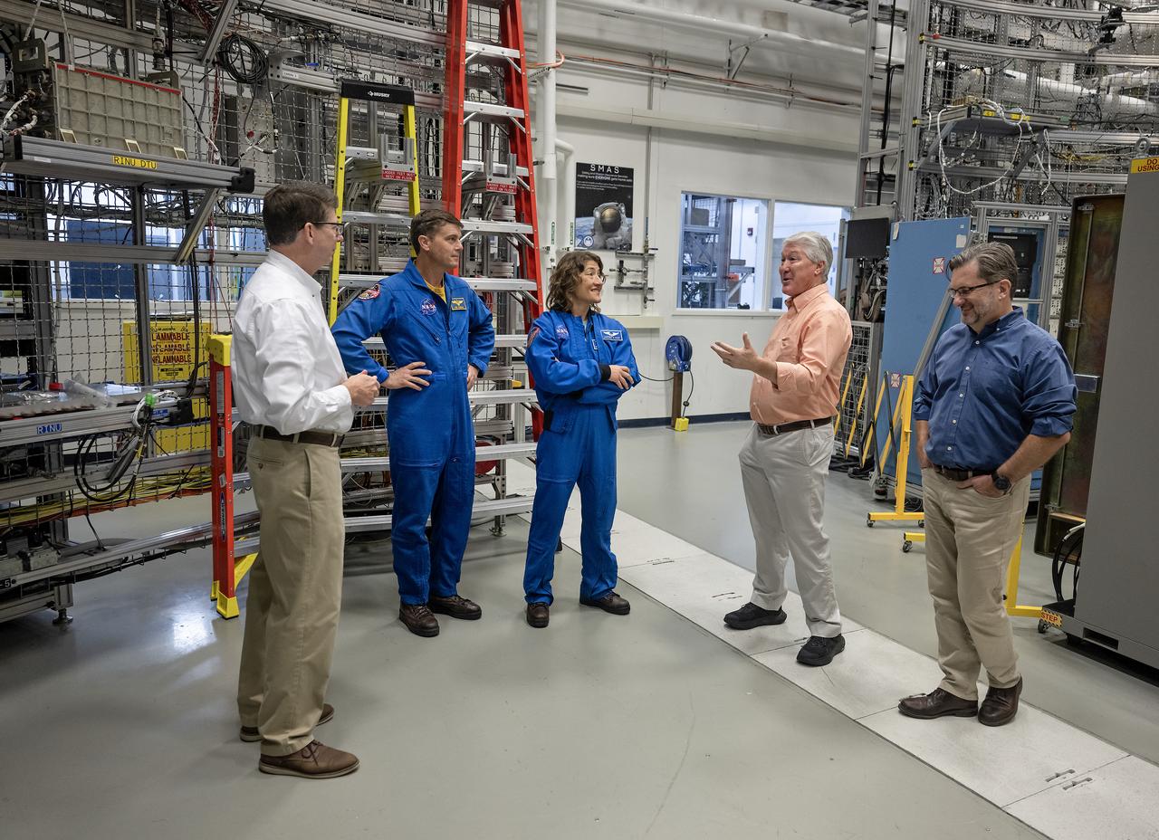 These photos show highlights from Artemis II NASA astronauts Victor Glover, Reid Wiseman, and Christina Koch of NASA and CSA (Canadian Space Agency) astronaut Jeremy Hansen visit to NASA’s Marshall Space Flight Center in Huntsville, Alabama, Nov. 27. The crew met and spoke to employees and viewed facilities for SLS (Space Launch System) rocket. All four astronauts signed the Orion stage adapter (OSA), a small ring structure that connects SLS to NASA’s Orion spacecraft, that will be used for Artemis II. Koch and Wiseman also visited the Systems Integration Lab, where SLS flight software testing is conducted. The four astronauts will launch atop SLS inside Orion to venture around the Moon on Artemis II, the first crewed flight for Artemis.