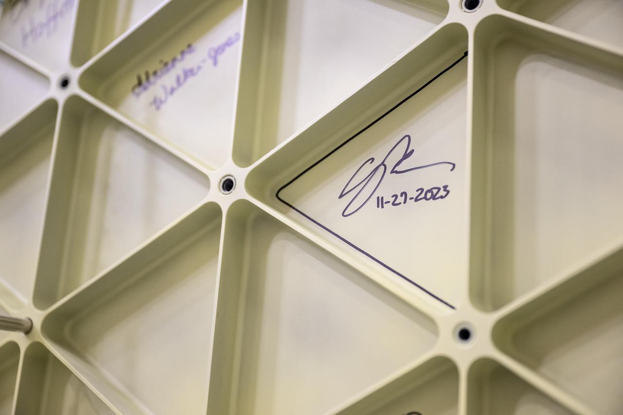 These photos show highlights from Artemis II NASA astronauts Victor Glover, Reid Wiseman, and Christina Koch of NASA and CSA (Canadian Space Agency) astronaut Jeremy Hansen visit to NASA’s Marshall Space Flight Center in Huntsville, Alabama, Nov. 27. The crew met and spoke to employees and viewed facilities for SLS (Space Launch System) rocket. All four astronauts signed the Orion stage adapter (OSA), a small ring structure that connects SLS to NASA’s Orion spacecraft, that will be used for Artemis II. Koch and Wiseman also visited the Systems Integration Lab, where SLS flight software testing is conducted. The four astronauts will launch atop SLS inside Orion to venture around the Moon on Artemis II, the first crewed flight for Artemis.