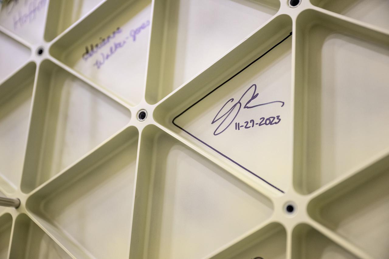 These photos show highlights from Artemis II NASA astronauts Victor Glover, Reid Wiseman, and Christina Koch of NASA and CSA (Canadian Space Agency) astronaut Jeremy Hansen visit to NASA’s Marshall Space Flight Center in Huntsville, Alabama, Nov. 27. The crew met and spoke to employees and viewed facilities for SLS (Space Launch System) rocket. All four astronauts signed the Orion stage adapter (OSA), a small ring structure that connects SLS to NASA’s Orion spacecraft, that will be used for Artemis II. Koch and Wiseman also visited the Systems Integration Lab, where SLS flight software testing is conducted. The four astronauts will launch atop SLS inside Orion to venture around the Moon on Artemis II, the first crewed flight for Artemis.