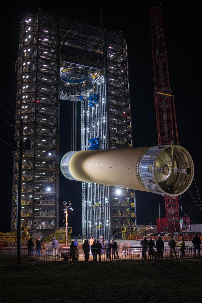 The Space Launch System (SLS) liquid hydrogen tank structural test article is loaded into Test Stand 4693 at NASA’s Marshall Space Flight Center in Huntsville, Alabama, on Jan. 14, 2019. The 149-foot piece of test hardware is the largest piece of structural hardware for the SLS core stage for America’s new deep space rocket Itis structurally identical to the flight version of the tank. It will undergo a series of tests in Test Stand 4693 to simulate the stresses and loads of liftoff and flight. These tests will help ensure designs are adequate for successful SLS missions to the Moon and beyond.