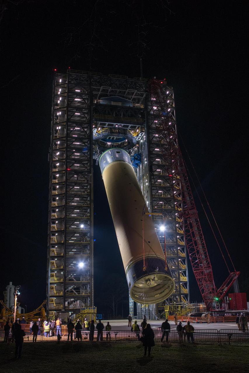 The Space Launch System (SLS) liquid hydrogen tank structural test article is loaded into Test Stand 4693 at NASA’s Marshall Space Flight Center in Huntsville, Alabama, on Jan. 14, 2019. The 149-foot piece of test hardware is the largest piece of structural hardware for the SLS core stage for America’s new deep space rocket Itis structurally identical to the flight version of the tank. It will undergo a series of tests in Test Stand 4693 to simulate the stresses and loads of liftoff and flight. These tests will help ensure designs are adequate for successful SLS missions to the Moon and beyond.