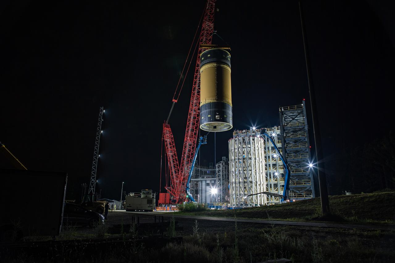 This collection of photos shows the steps NASA engineers took to lift the final structural test article for NASA’s Space Launch System (SLS) core stage into Test Stand 4697 at NASA’s Marshall Space Flight Center in Huntsville, Alabama, July 10, 2019. The liquid oxygen (LOX) tank is one of two propellant tanks in the rocket’s massive core stage that will produce more than 2 million pounds of thrust to help launch Artemis 1, the first flight of NASA’s Orion spacecraft and SLS, to the Moon. The nearly 70-foot-long liquid oxygen tank structural test article was manufactured at NASA’s Michoud Assembly Facility in New Orleans and delivered by NASA’s barge Pegasus to Marshall. Once bolted into the test stand, dozens of hydraulic cylinders will push and pull the tank, subjecting it to the same stresses and forces it will endure during liftoff and flight, to verify it is fit for flight.