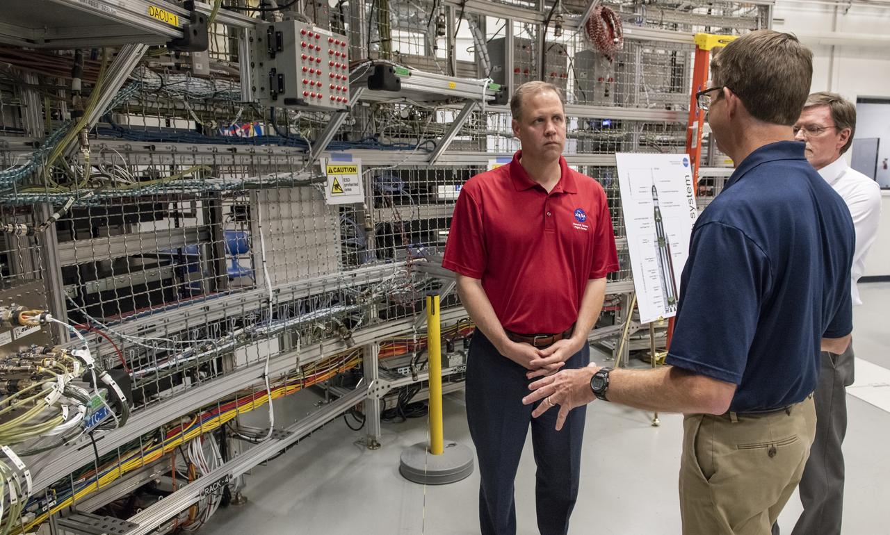 On August 15, 2018 NASA Administrator Jim Bridenstine visited Marshall Space Flight Center. Upon his arrival he was greeted by MSFC Acting Director Jody Singer along with the senior management team. During his tour of the Marshall Center, Bridenstine visited the System Integration Lab and the Software Integration and Testing Facility where Marshall is supporting end-to-end integrated avionics and software integration, check-out, verification and validation for the systems that will control the Space Launch System rocket during its flight and ascent. 