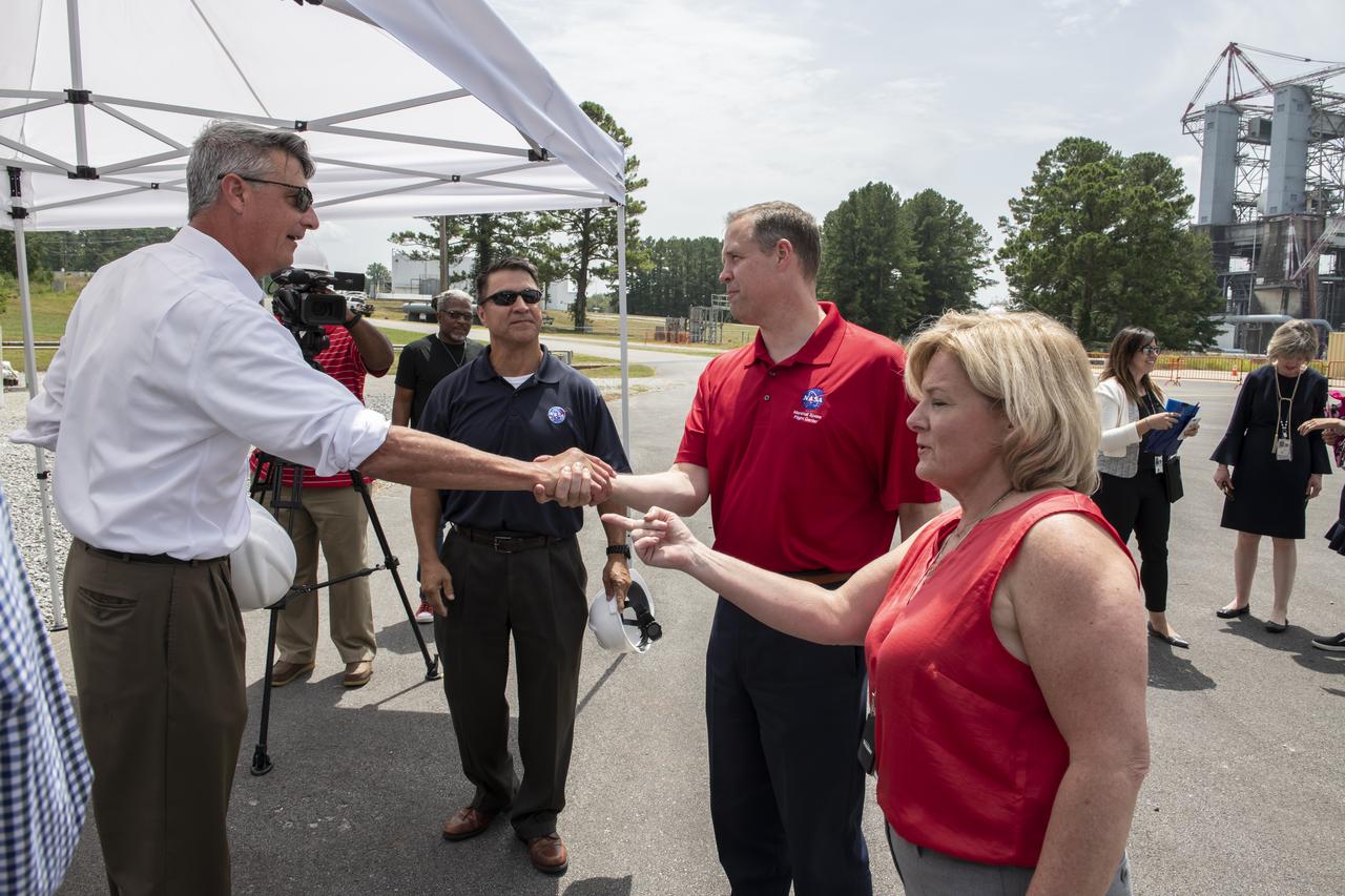 On August 15, 2018 NASA Administrator Jim Bridenstine visited Marshall Space Flight Center. Upon his arrival he was greeted by MSFC Acting Director Jody Singer along with the senior management team. From atop Marshallâ€™s Test Stand 4693, NASA Administrator Jim Bridenstine and SLS Stages Integration Manager Tim Flores discuss the capabilities of Marshallâ€™s newest test stand. The qualification test version of the liquid hydrogen tank for the Space Launch Systemâ€™s core stage will be positioned between the standâ€™s 221-foot-tall twin towers where it will be pushed, pulled and subjected to the stresses it will endure during liftoff and flight.