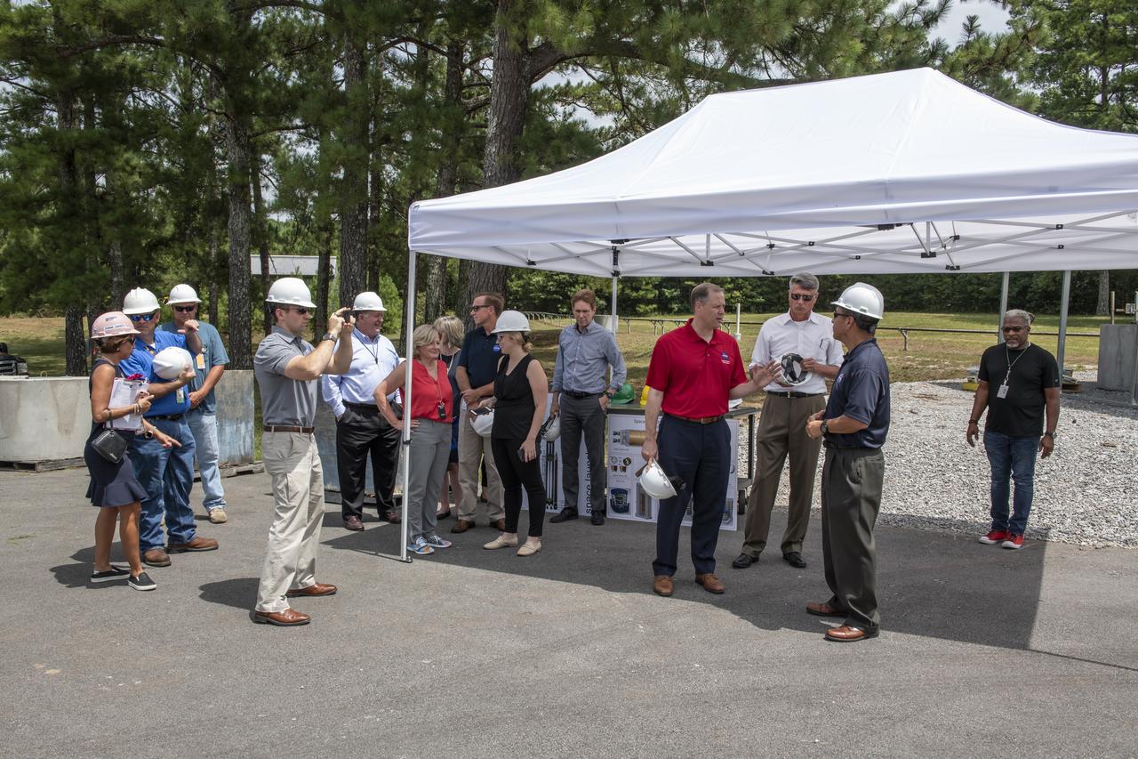 On August 15, 2018 NASA Administrator Jim Bridenstine visited Marshall Space Flight Center. Upon his arrival he was greeted by MSFC Acting Director Jody Singer along with the senior management team. From atop Marshall’s Test Stand 4693, NASA Administrator Jim Bridenstine and SLS Stages Integration Manager Tim Flores discuss the capabilities of Marshall’s newest test stand. The qualification test version of the liquid hydrogen tank for the Space Launch System’s core stage will be positioned between the stand’s 221-foot-tall twin towers where it will be pushed, pulled and subjected to the stresses it will endure during liftoff and flight.