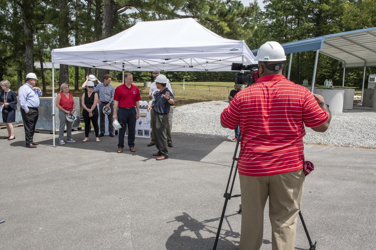 On August 15, 2018 NASA Administrator Jim Bridenstine visited Marshall Space Flight Center. Upon his arrival he was greeted by MSFC Acting Director Jody Singer along with the senior management team. From atop Marshallâ€™s Test Stand 4693, NASA Administrator Jim Bridenstine and SLS Stages Integration Manager Tim Flores discuss the capabilities of Marshallâ€™s newest test stand. The qualification test version of the liquid hydrogen tank for the Space Launch Systemâ€™s core stage will be positioned between the standâ€™s 221-foot-tall twin towers where it will be pushed, pulled and subjected to the stresses it will endure during liftoff and flight.